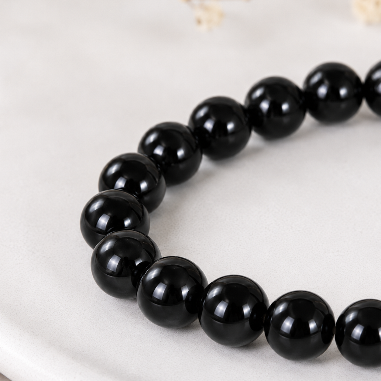 Detail of the feng shui black obsidian bracelet