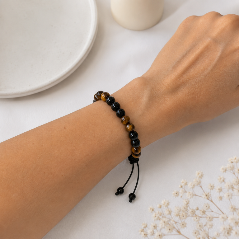 Close-up of tiger eye and obsidian beads