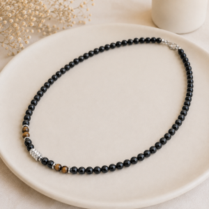 Men's black obsidian necklace on a leather cord
