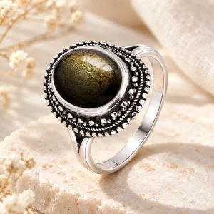 Bague en argent à couronne perlée, cabochon rond d'obsidienne dorée