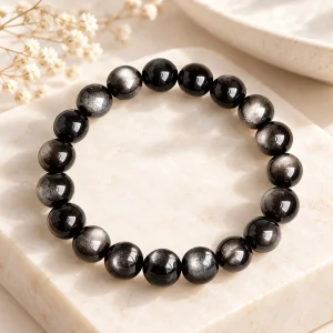 Bracelet obsidienne argentée 10 mm, perles rondes au voile gris métallique