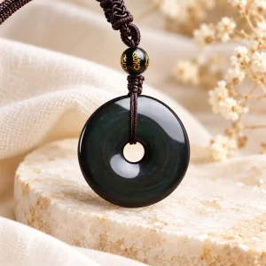 Pendentif donut en obsidienne arc-en-ciel, couronne au reflet vert profond