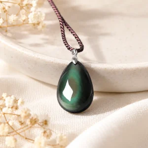 Pendentif goutte d'obsidienne arc-en-ciel, dôme bombé à l'œil vert centré